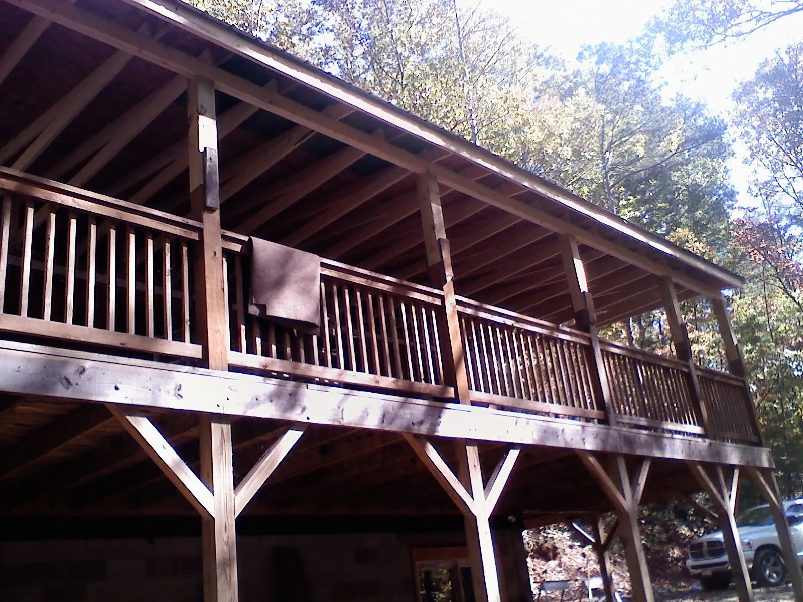 Timber framing under a new elevated porch and deck — Roof Leak Repair in White Oak by Roofing Brothers